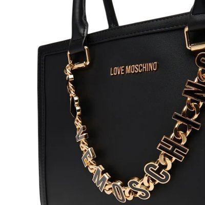 THE DANGLING HANDBAG